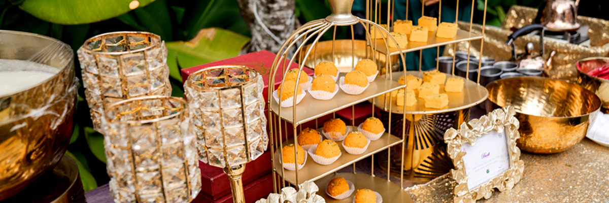 Indian Wedding dessert buffet with Ladoo and Barfi Sweets by Queen's Catering Bali